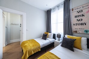 Iron/ironing board, travel crib, free WiFi, bed sheets
