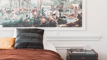 Rideaux occultants, chambres insonorisées, fer et planche à repasser