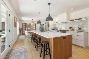 Microwave, stovetop, dishwasher, coffee/tea maker