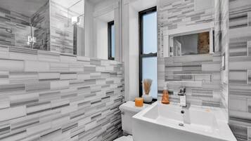 Shower, hair dryer, towels