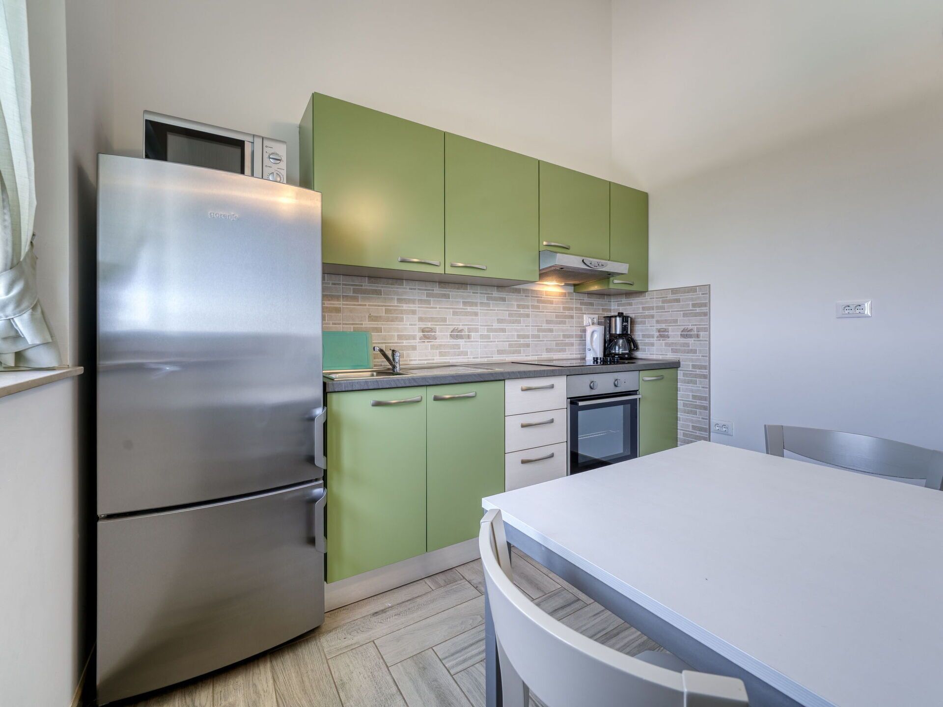 Kitchen, Kitchen Appliance, Flooring, Interior Design, Furniture, Major Appliance, Countertop, Floor, Wood, Cabinetry