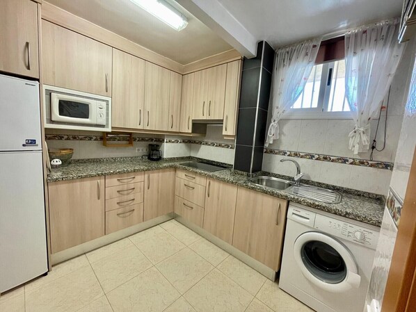 Fridge, microwave, oven, coffee/tea maker