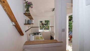 Fridge, toaster, cookware/dishes/utensils