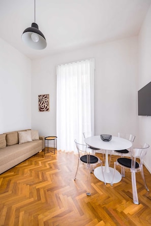 Deluxe Condo, City View | Living area - Thelos Apartment (Naples)