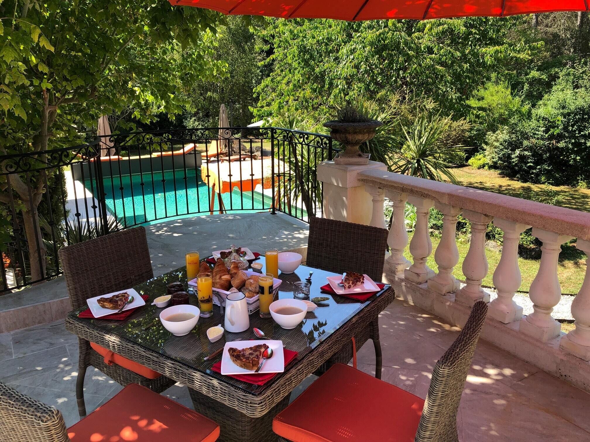 Deluxe Quadruple Room, Pool View | Terrace/patio