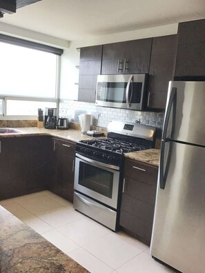 Fridge, microwave, oven, stovetop