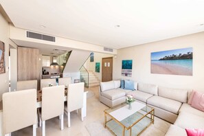 Luxe 3BDR w/ Private Rooftop Jacuzzi & Beach Access (M1-7B-22) | Living area | 55-inch Smart TV with satellite channels
