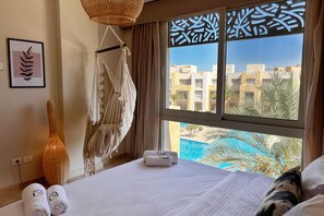 Apartment | 17 bedrooms, laptop workspace, iron/ironing board, bed sheets - Xuru Stays I Exotic 1bdr w/ Outdoor Terrace Pool & Beach Access (El Gouna)