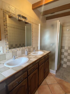Shower, hair dryer, towels, soap
