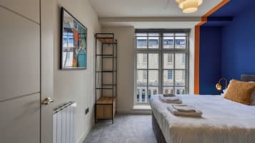 Apartemen, 1 kamar tidur, kamar mandi pribadi | Setrika/meja setrika dan seprai linen