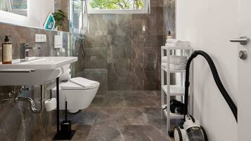 Shower, hair dryer, towels