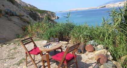 Unique place at the cliff, secluded mediterranean habitat, two beaches.