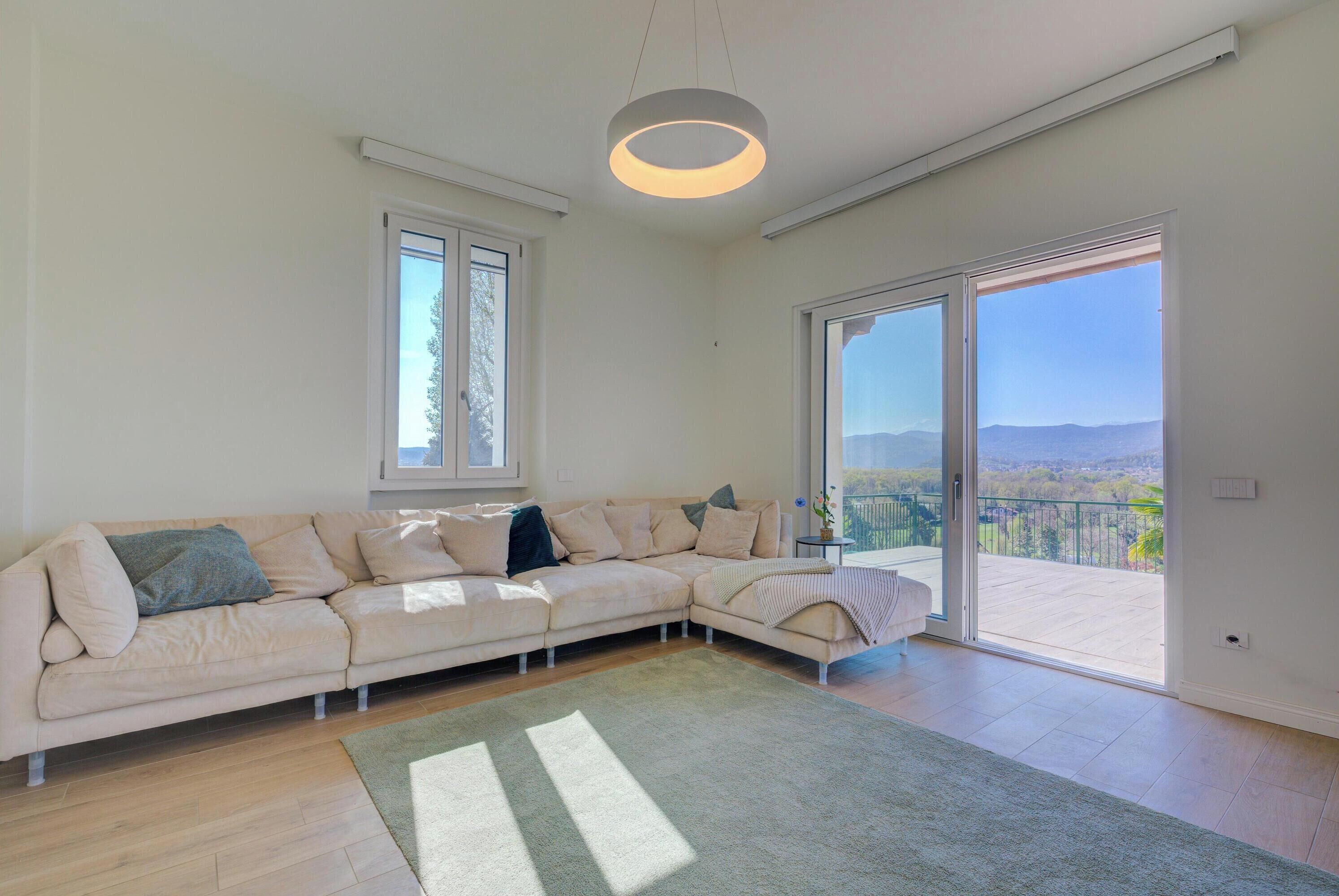 Family Villa, Multiple Bedrooms (Villa La Rocca close to MXP &) | Living area | 21-inch flat-screen TV with cable channels