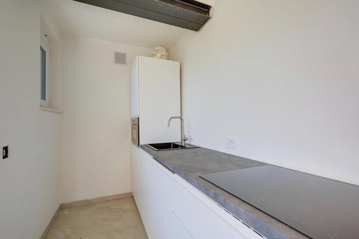 Family Apartment, 2 Bedrooms, 2 Bathrooms (Appartamento Vista Rosa) | Private kitchen | Fridge, dishwasher