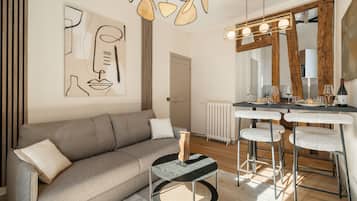 Superior Apartment, Courtyard View | Living area | 80-cm Smart TV with digital channels