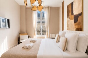 Apartamento superior, vistas al patio | Zona de estar