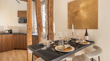Superior Apartment, Courtyard View | Living area | 80-cm Smart TV with digital channels