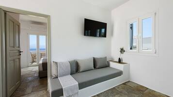 Apartamento superluxo, vista para o mar | Área de estar