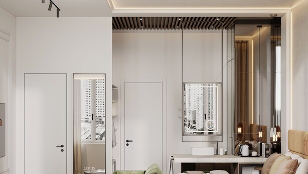 A modern hotel room with a large mirror, a sofa, a bed, and a view of high-rise buildings. - LOVIS Suites Vienna - NEW OPENING (Vienna)