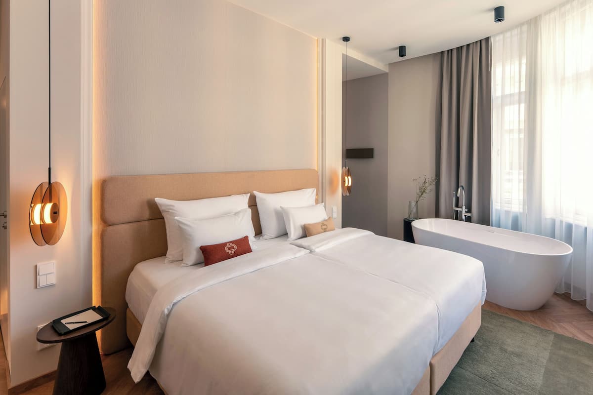 Hypo-allergenic bedding, minibar, in-room safe, desk