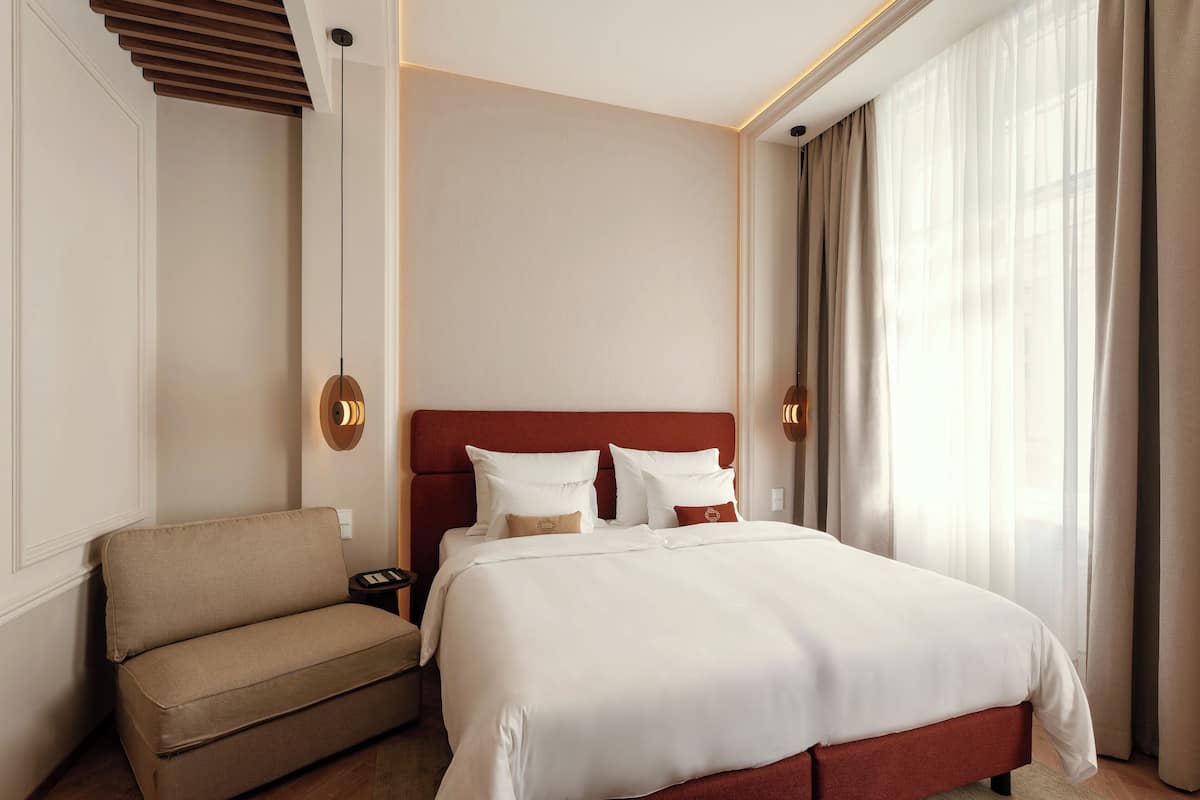 Hypo-allergenic bedding, minibar, in-room safe, desk