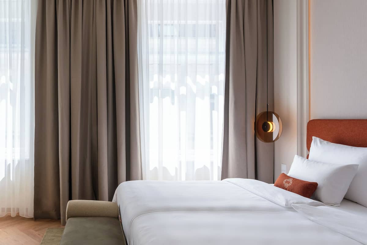 Hypo-allergenic bedding, minibar, in-room safe, desk