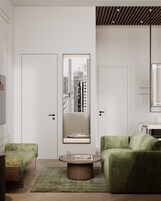 Una sala de estar moderna con un sofá verde, una mesa de centro redonda y un espejo grande que refleja un paisaje urbano.