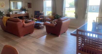 New Home! Walk to Bay, Quick drive to Beach, two King Beds! Bring your Boat!