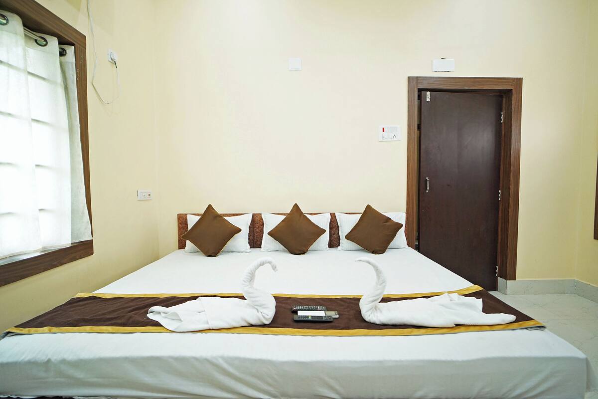 Dobbeltrom – deluxe, hageutsikt