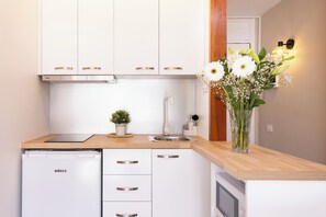 Microwave, stovetop, coffee/tea maker, toaster