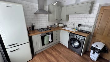 Fridge, toaster, cookware/dishes/utensils