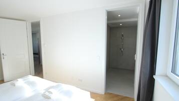 Apartamento superior, vista para a cidade | Banheiro