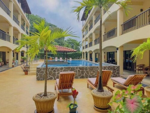 New Listing in Coco Beach 2 bdrm 2 bath w/ Pool.