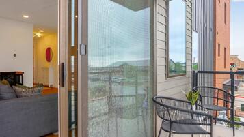 Condo, 1 Queen Bed with Sofa bed, Balcony (Creekside Modern) | Terrace/patio