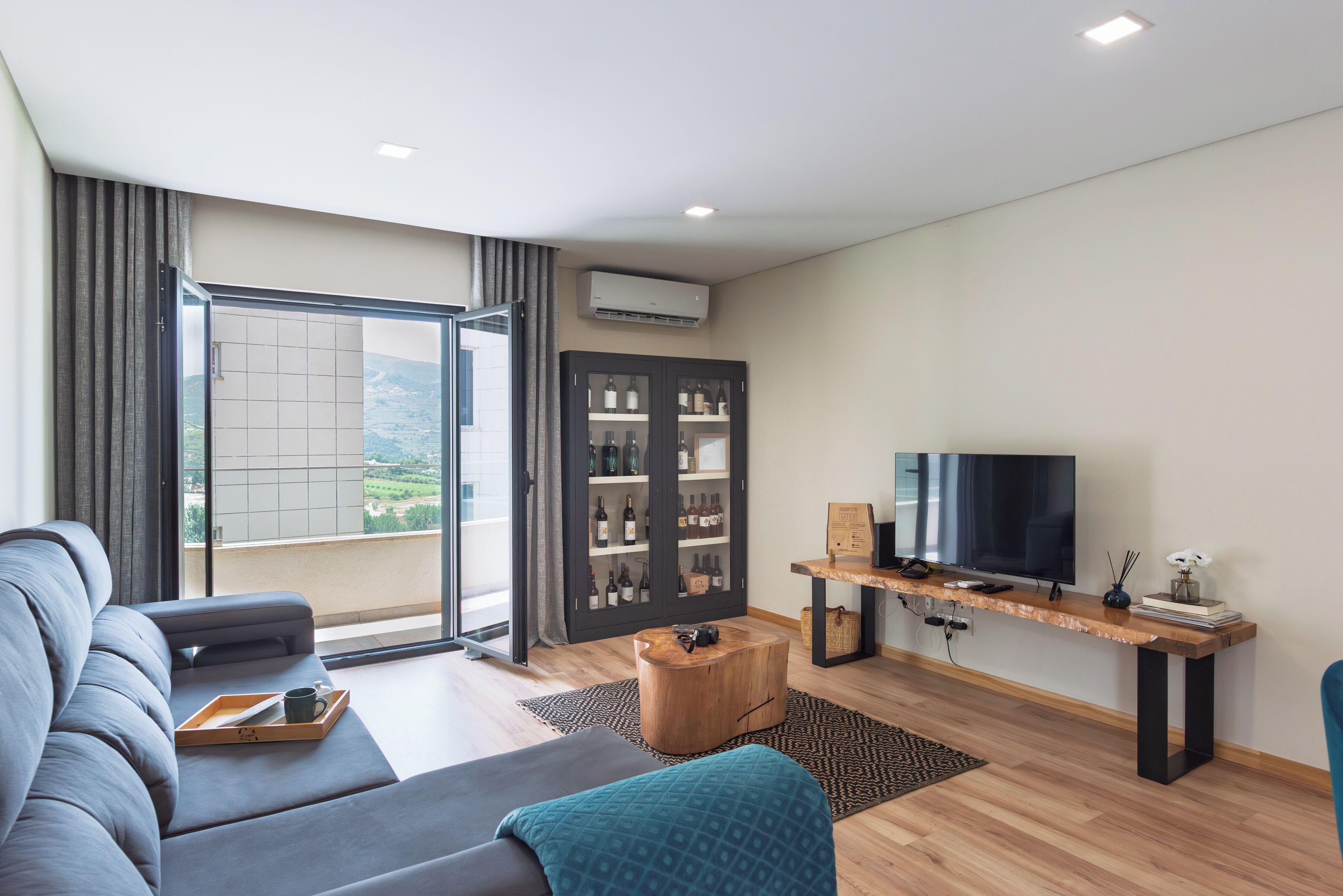 Apartment, River View | Living area | Flat-screen TV