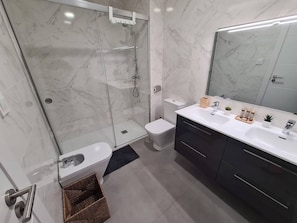 Hair dryer, bidet, towels, soap
