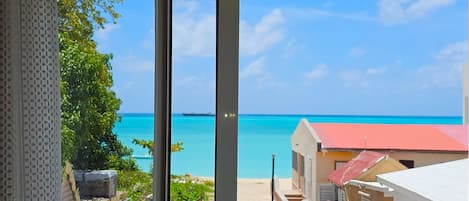 Comfort Room, 1 King Bed, Non Smoking, Ocean View | Iron/ironing board, free WiFi