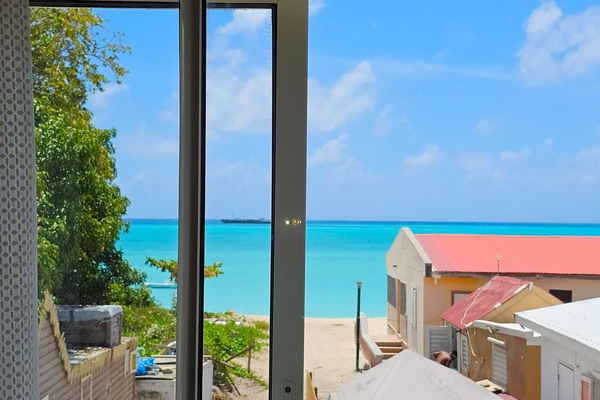 Comfort Room, 1 King Bed, Non Smoking, Ocean View | Iron/ironing board, free WiFi