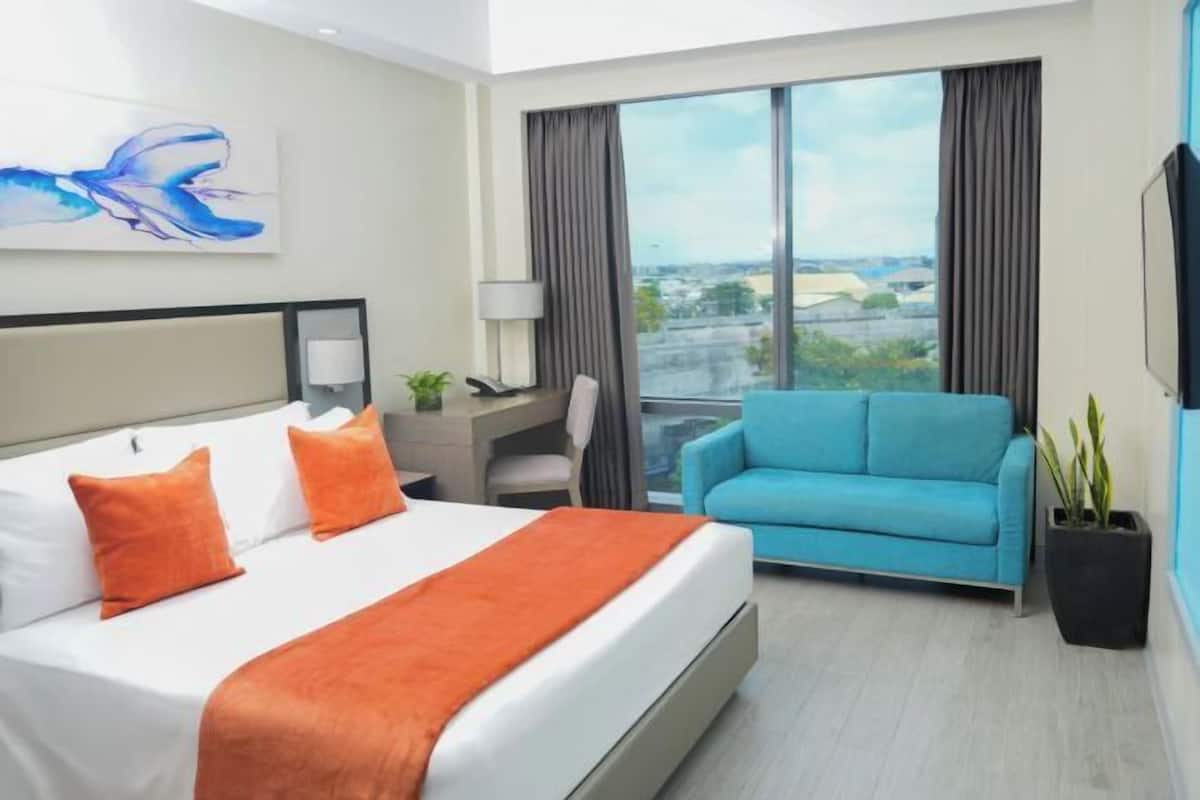 In-room safe, desk, laptop workspace, blackout curtains