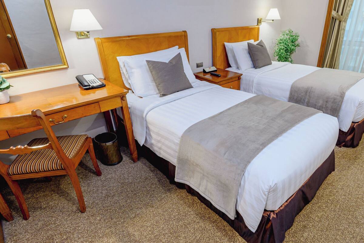 City-Central Haven in Metro Manila near Megamall | In-room safe, desk, laptop workspace, blackout curtains