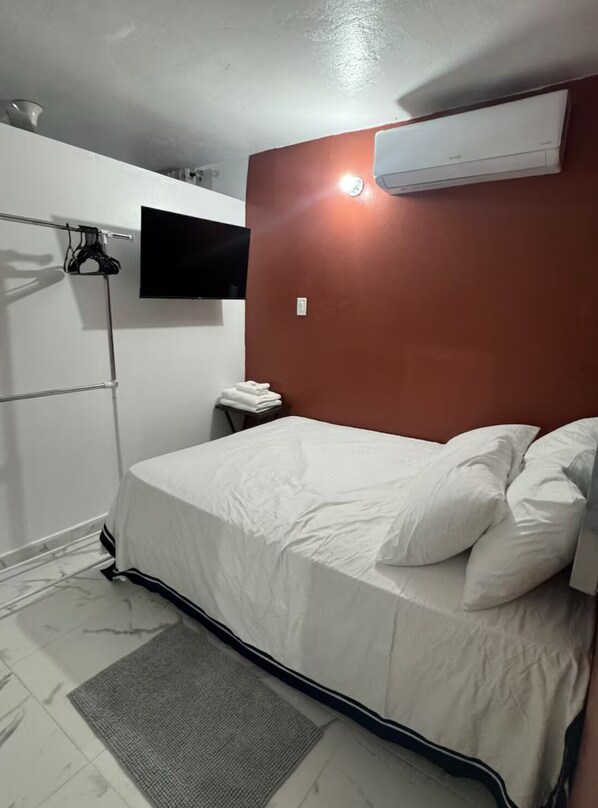 1 slaapkamer, een strijkplank/strijkijzer, wifi, beddengoed