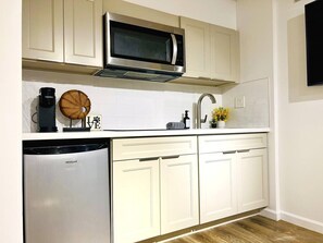 Microwave, stovetop, coffee/tea maker, toaster