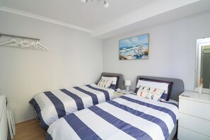 2 室のベッドルーム、客室ごとに異なる装飾、客室ごとに異なるインテリア、WiFi (無料)