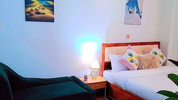 3 habitaciones, tabla de planchar con plancha, wifi y ropa de cama