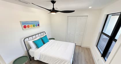 4BR/3BA Spacious Waterfront w/ Dock, Beach Access, Paddle Board, Bikes & More