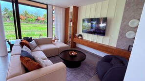 Téléviseur, jeux vidéo, table de baby-foot, table de ping-pong