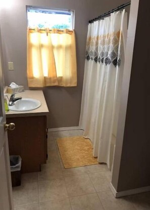 Hair dryer, towels, soap, shampoo