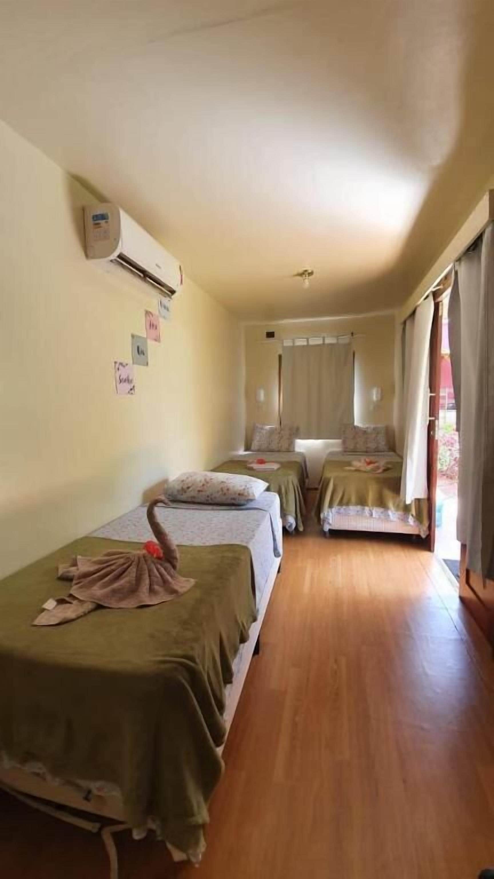 Deluxe Triple Room, Balcony, Garden View | Free WiFi, bed sheets