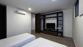 Tabla de planchar con plancha, wifi y ropa de cama