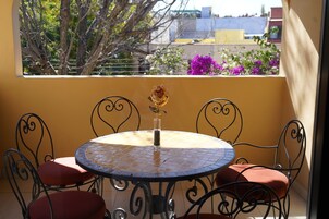 Suite familiar, balcón | Terraza o patio